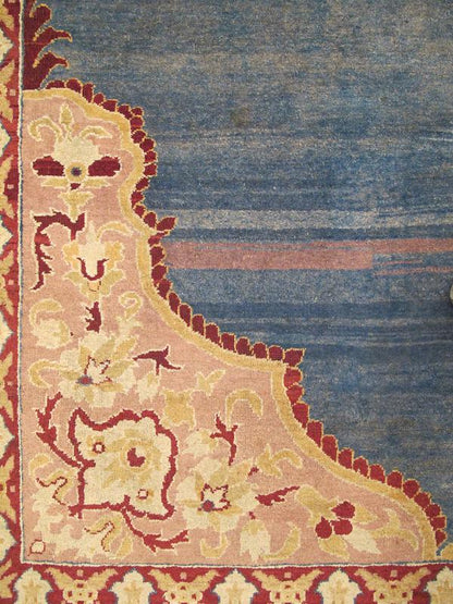 Antique 19th Century Indian Agra Rug in Solid Blue Background This stunning antique Agra carpet beautifully illustrates the magnificent splendor of mid - 19th Century Indian design and craftsmanship. The unusually bold open center field in various... - Keivan Woven ArtsE - 1009 - 677Rug