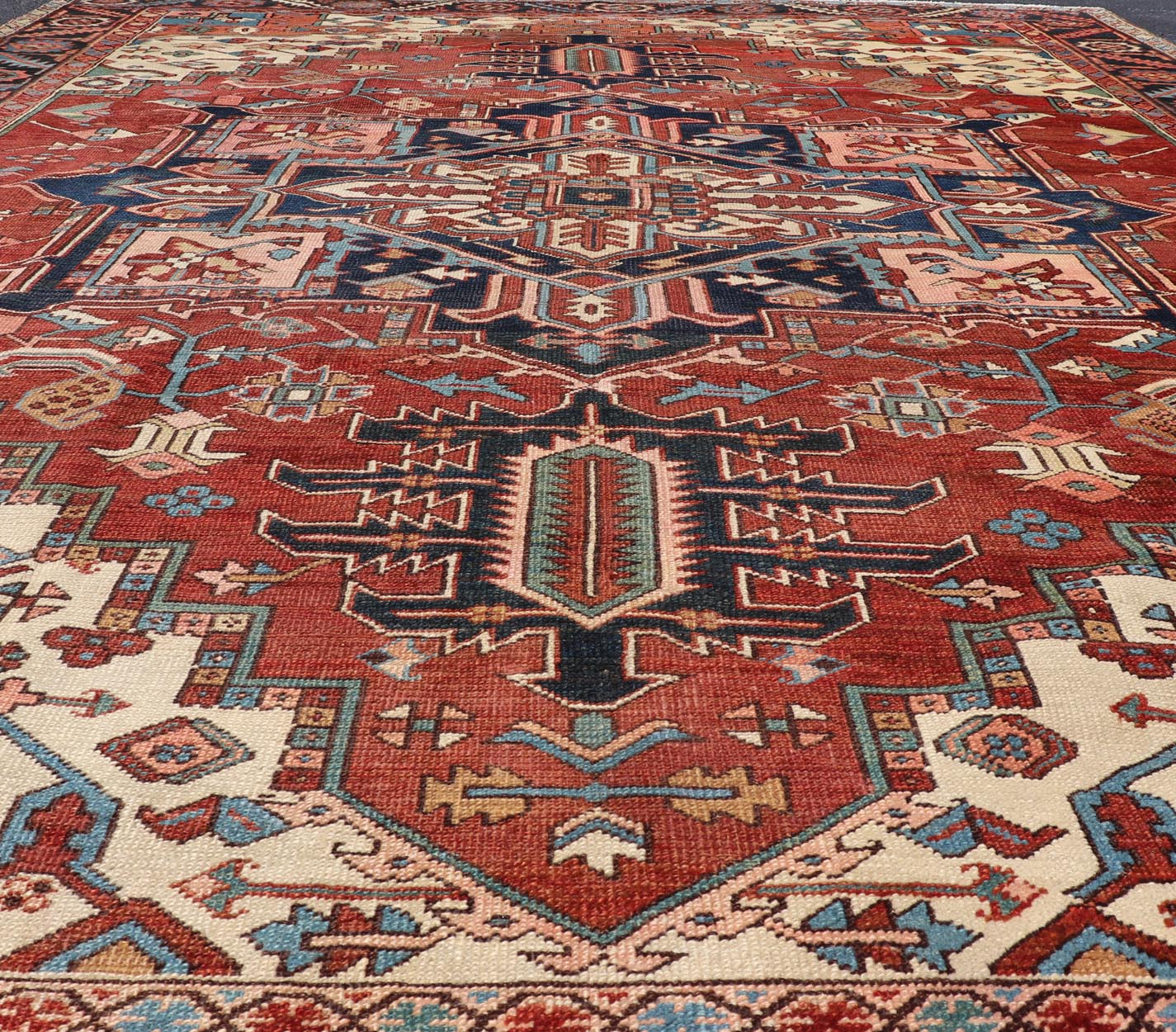 Antique Persian Serapi Carpet with bold Stylized Geometric medallion. Keivan Woven Arts / Rug / E - 1105, country of origin / type: Iran / Serapi, circa 1900. Measures: 9'5 x 12' This magnificent antique Persian circa 1900 Serapi carpet be... - Keivan Woven ArtsE - 1105 - 681Rug