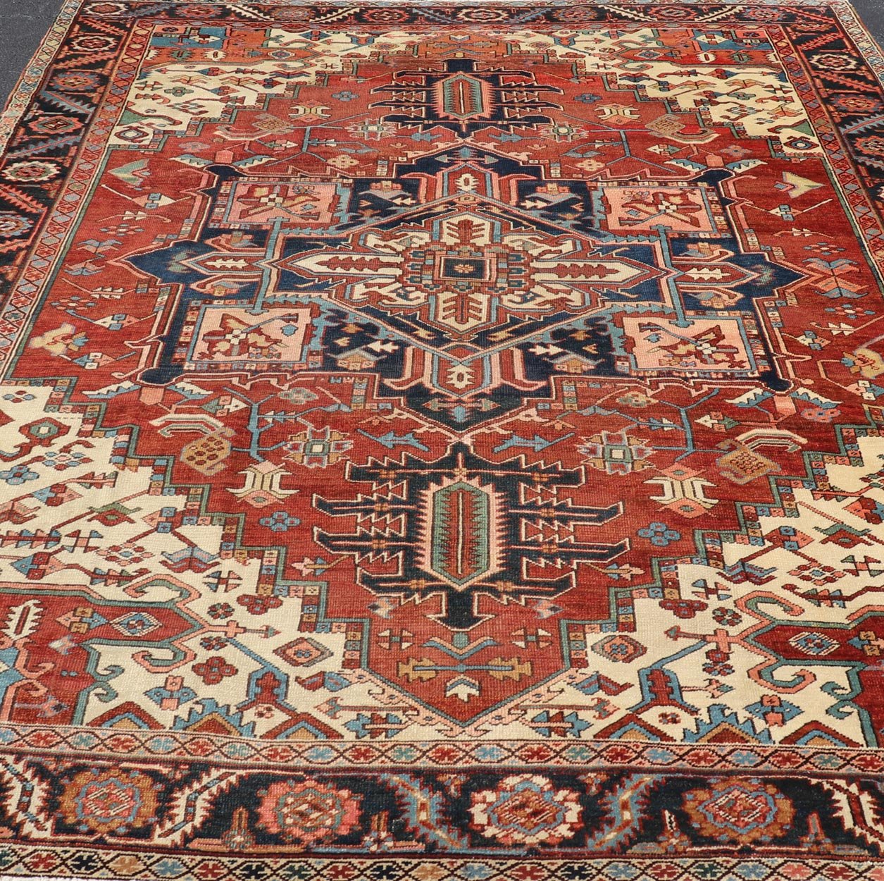 Antique Persian Serapi Carpet with bold Stylized Geometric medallion. Keivan Woven Arts / Rug / E - 1105, country of origin / type: Iran / Serapi, circa 1900. Measures: 9'5 x 12' This magnificent antique Persian circa 1900 Serapi carpet be... - Keivan Woven ArtsE - 1105 - 681Rug
