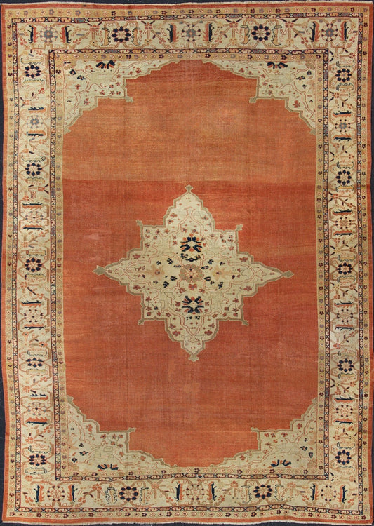 Large Antique Ziegler Sultanabad rug with central medallion in soft orange, ivory and pops of navy blue. Keivan Woven Arts / E - 1207. Late 19th Century Persian Antique Ziegler, antique Persian Ziegler. Measures: 10'2 x 14'5 This striking antique Z... - Keivan Woven ArtsE - 1207 - 1827Rug