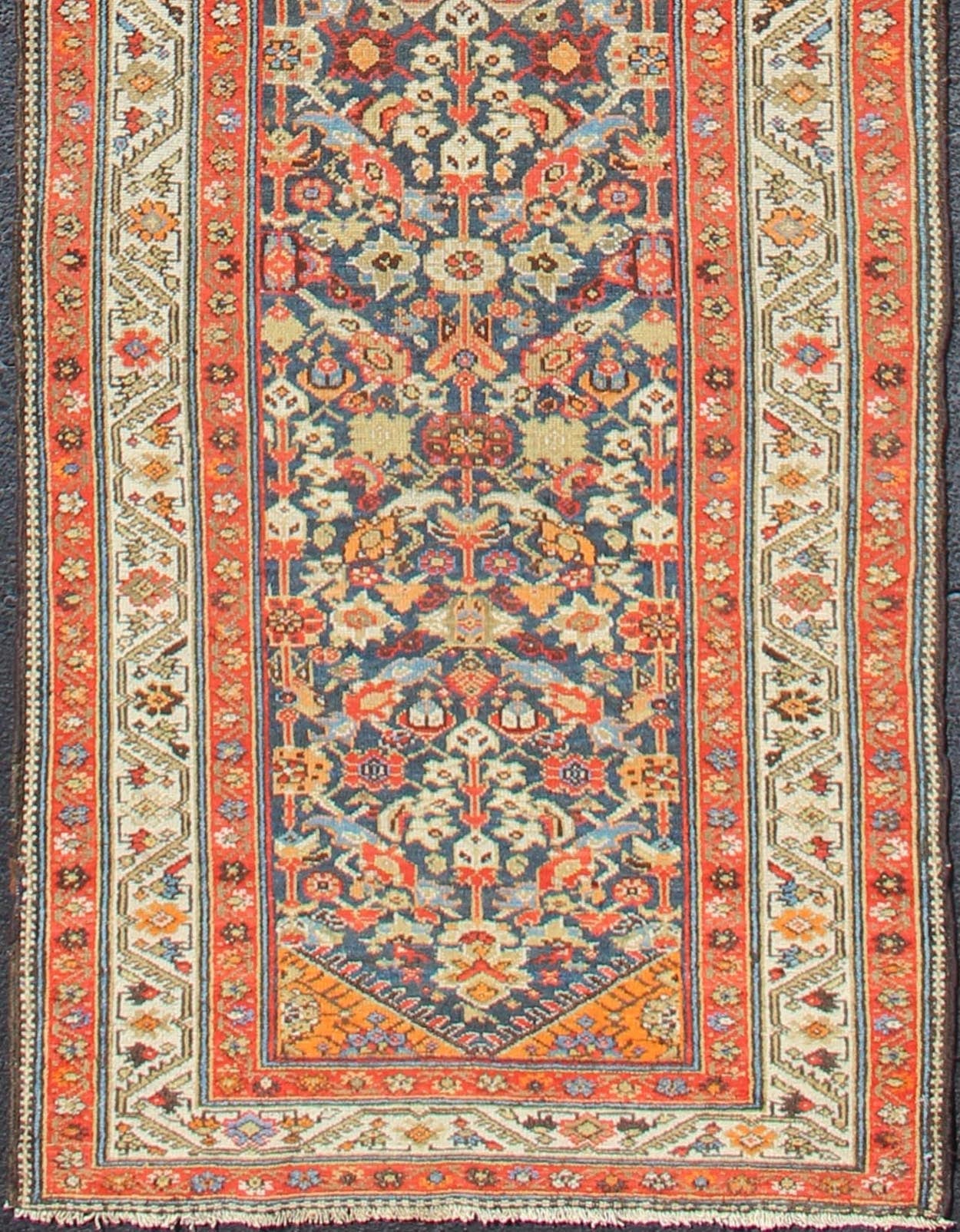 Long Persian Runner With Blue and Orange in Geometric All Over Pattern L Variegated Border Malayer antique runner from Persia with geometric repeating pattern in the background which Hosts to variegated shades of blue The main border is ivory while ... - Keivan Woven ArtsEB - 2005 - 12593Rug