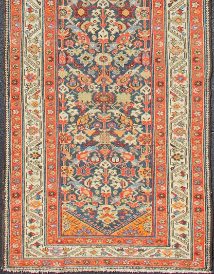 Long Persian Runner With Blue and Orange in Geometric All Over Pattern L Variegated Border Malayer antique runner from Persia with geometric repeating pattern in the background which Hosts to variegated shades of blue The main border is ivory while ... - Keivan Woven ArtsEB - 2005 - 12593Rug