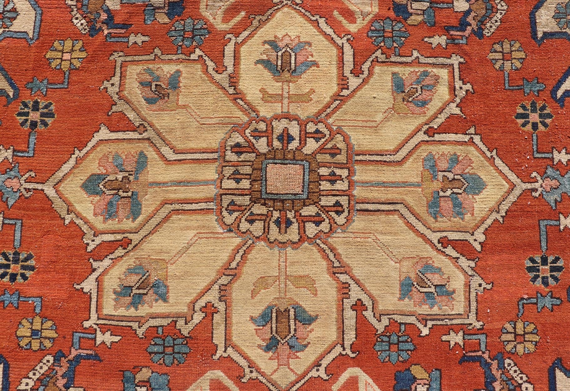 Antique Persian Serapi Rug in Geometric Medallion Design with Orange, blue & Cream. Antique Persian Serapi rug with colorful and detailed layered medallion in Rust, Orange, ivory & medium blue, light green, light orange, Salmon. Keivan Woven Ar... - Keivan Woven ArtsEB - 200644 - 13086Rug