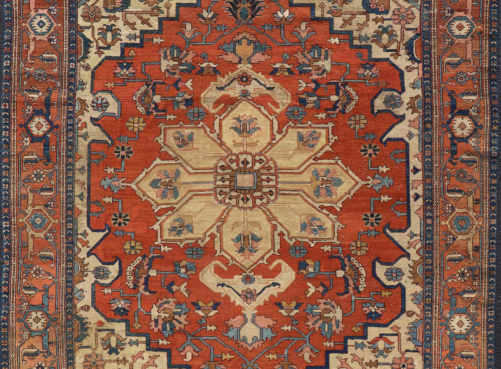 Antique Persian Serapi Rug in Geometric Medallion Design with Orange, blue & Cream. Antique Persian Serapi rug with colorful and detailed layered medallion in Rust, Orange, ivory & medium blue, light green, light orange, Salmon. Keivan Woven Ar... - Keivan Woven ArtsEB - 200644 - 13086Rug