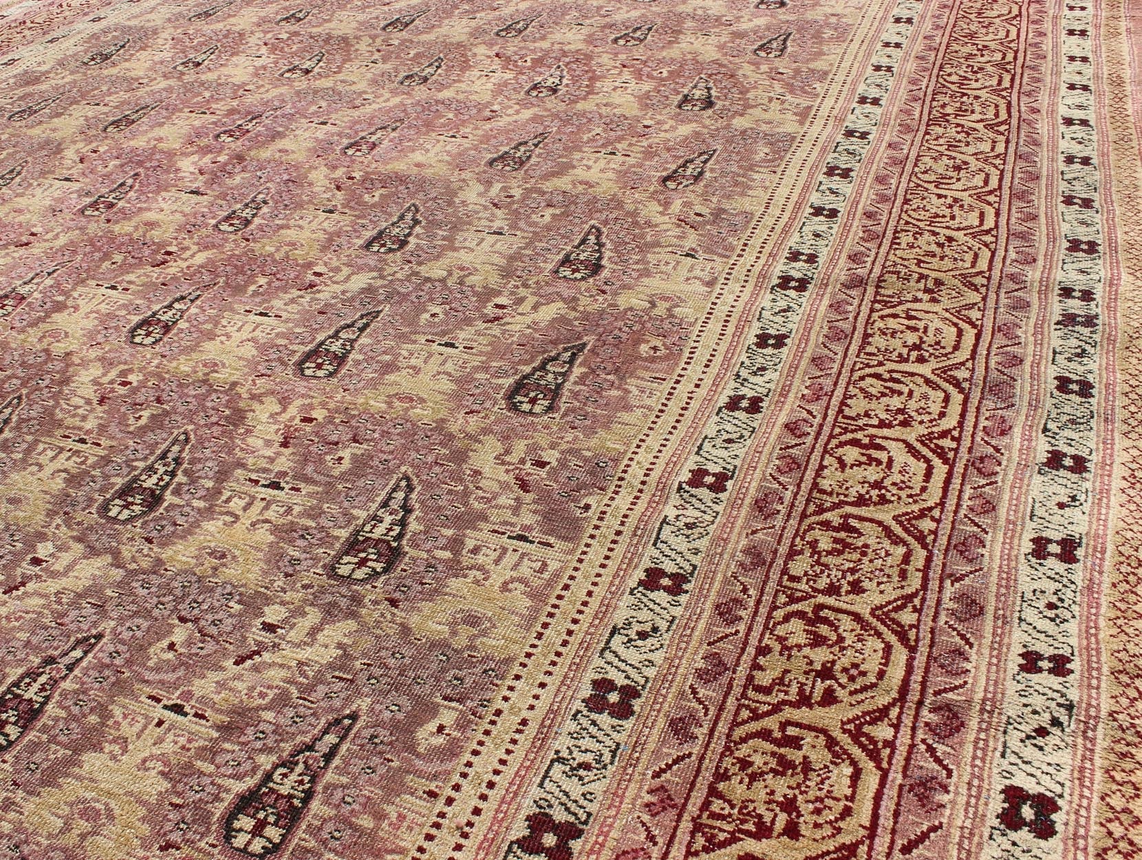 Antique Indian Amritsar rug with all - over Paisley pattern in ivory, pink, Lavender, purple, Cream, light yellow & red. Antique Indian Amritsar rug, Keivan Woven Arts/ rug/ EBD - 1001, country of origin / type: India / Amritsar, circa 1890 Measures... - Keivan Woven ArtsEBD - 1001 - 8761Rug