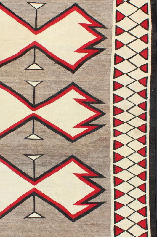 Antique Ganado Navajo Rug With Geometric Design in Red, Black, Ivory and Gray This beautiful antique Navajo textile is from the Ganado region and features a carded gray field with aniline - dyed red and black diamond crosses. The unique border of ... - Keivan Woven ArtsEBD - 1002 - 6544Rug