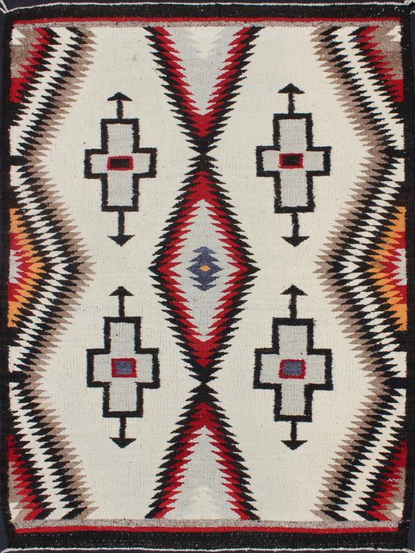 Antique Navajo Rug in Gray, Ivory, Black, Orange, and Red This Southwestern Navajo rug features designs and coloring most consistent with textiles that originated at the Ganado Trading Post. It's woven of native, hand - spun wool in natural color... - Keivan Woven ArtsEBD - 1007 - 6470Rug