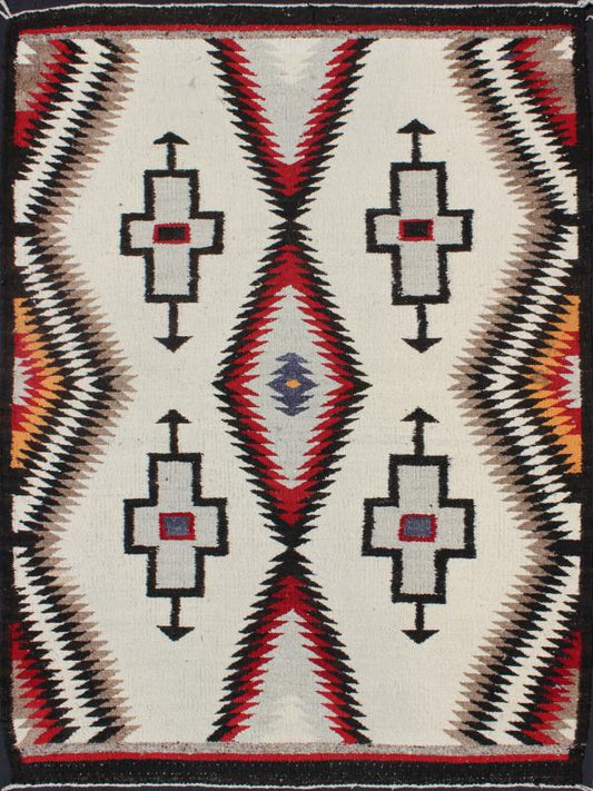 Antique Navajo Rug in Gray, Ivory, Black, Orange, and Red This Southwestern Navajo rug features designs and coloring most consistent with textiles that originated at the Ganado Trading Post. It's woven of native, hand - spun wool in natural color... - Keivan Woven ArtsEBD - 1007 - 6470Rug