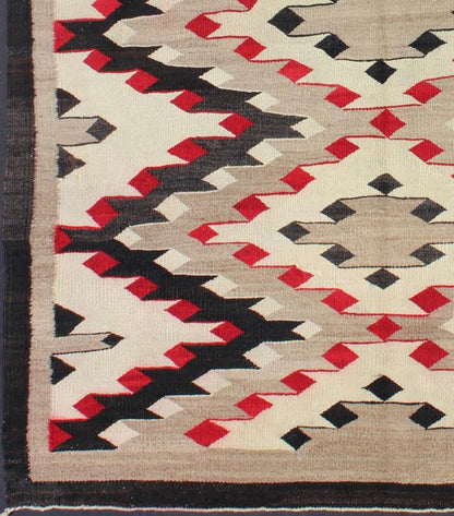 Vintage Navajo Rug with All Over Geometric in Gray, Red, Black and Cream This intriguing vintage Navajo rug was woven in the United States during the first half of the 20th century. The exciting and unique composition boasts a captivating geomet... - Keivan Woven ArtsEBD - 1022 - 6560Rug