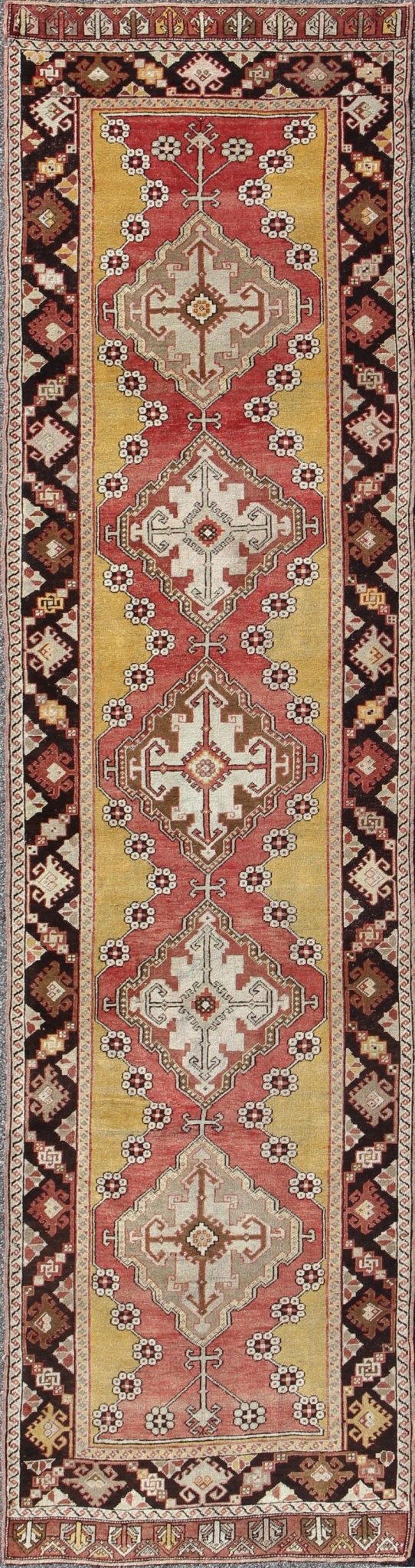 Antique Turkish Oushak Long Runner with Medallions in Brown and Goldish Yellow. Salmon, Brown and Goldish Yellow antique Turkish Oushak runner with medallions, rug EL - 13005, country of origin / type: Turkey / Oushak, circa 1930 This antique ... - Keivan Woven ArtsEL - 13005 - 1450Rug