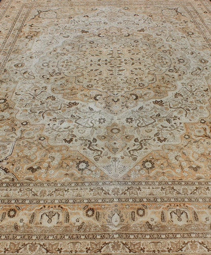 Antique Persian Tabriz Haji Jalili type rug with layered medallion in coral, gray, peach, taupe, cream. Keivan Woven Arts / EMA - 7510, country of origin / type: Iran / Tabriz, circa 1900 Measures: 11' x 16'8. This light colored antique Persian Ta... - Keivan Woven ArtsEMA - 7510 - 8831Rug