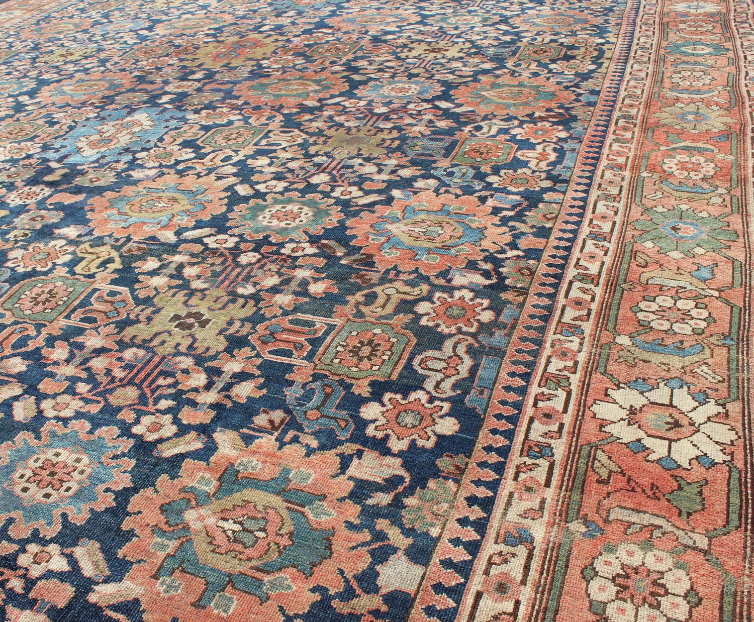 Very Large Antique Persian Hamedan Rug with Blossom Design in Blue Background. Mansion size antique Persian Hamedan rug in large scale sub geometric blossom design, rug EMA - 7511, country of origin / type: Iran / Hamedan, circa 1900. Measu... - Keivan Woven ArtsEMA - 7511 - 8837Rug