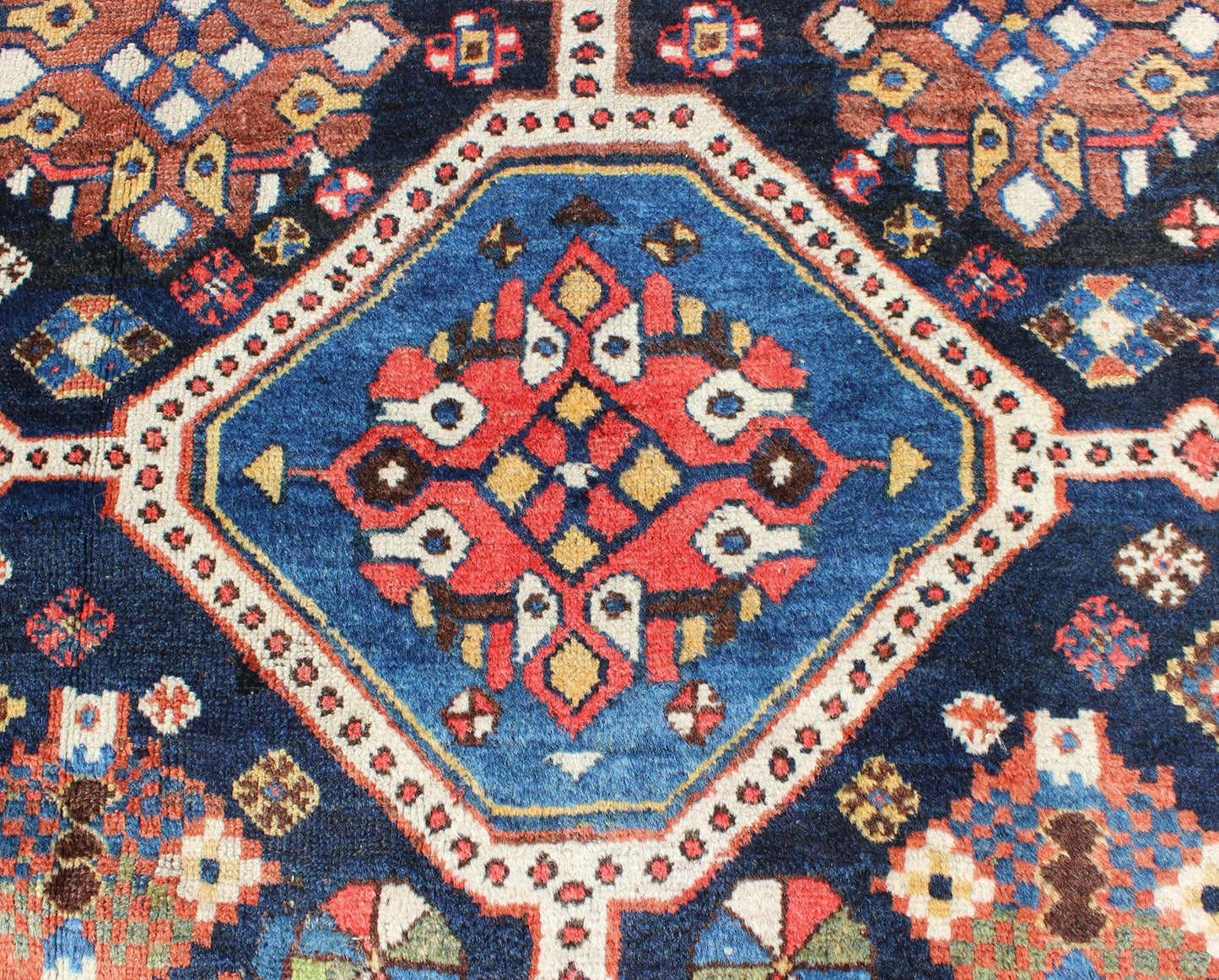 Antique Persian Qashqai Rug with Four - Medallion Design in Blue, Red, Brown Tones kwarugs Tribal Qashqai Gallery rug from Persia with geometric designs in multi - colors, rug ema - 7551, country of origin / type: Iran / Qashqai, circa 1910. Th... - Keivan Woven ArtsEMA - 7551 - 9798Rug