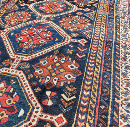Antique Persian Qashqai Rug with Four - Medallion Design in Blue, Red, Brown Tones kwarugs Tribal Qashqai Gallery rug from Persia with geometric designs in multi - colors, rug ema - 7551, country of origin / type: Iran / Qashqai, circa 1910. Th... - Keivan Woven ArtsEMA - 7551 - 9798Rug