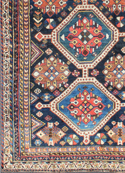 Antique Persian Qashqai Rug with Four - Medallion Design in Blue, Red, Brown Tones kwarugs Tribal Qashqai Gallery rug from Persia with geometric designs in multi - colors, rug ema - 7551, country of origin / type: Iran / Qashqai, circa 1910. Th... - Keivan Woven ArtsEMA - 7551 - 9798Rug