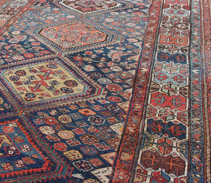 Blue and red antique Persian Hamedan rug with vertical diamond multi - medallions, rug ema - 7563, country of origin / type: Iran / Hamedan, circa 1890. This magnificent antique Hamedan features beautiful coloration, including tones of blue, red, nu... - Keivan Woven ArtsEMA - 7563 - 9820Rug