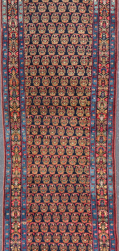 Antique Persian Malayer Paisley Design Runner in Red, Orange, and Blue Measures 3'7 x 18'7 This antique Persian Malayer features a denim blue guard for the small banded border, decorated with modest motifs in varying shades of blue, gree... - Keivan Woven ArtsEMA - 7585 - 10018Rug