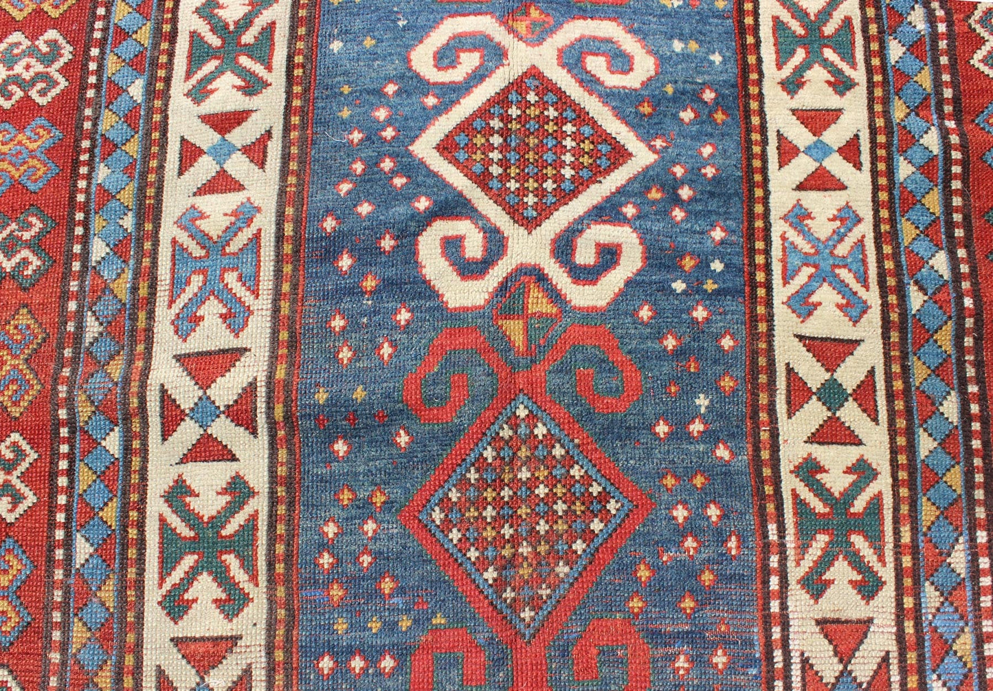 Red and Blue Antique Caucasian Kazak Rug with Vertical Tribal Medallions. Keivan Woven Arts / rug EMAC - 001, country of origin / type: Caucasus / Kazak, circa 1890 Measures: 4' x 8'10 The field design of this late 19th century antique Caucasian K... - Keivan Woven ArtsEMAC - 001 - 8801Rug