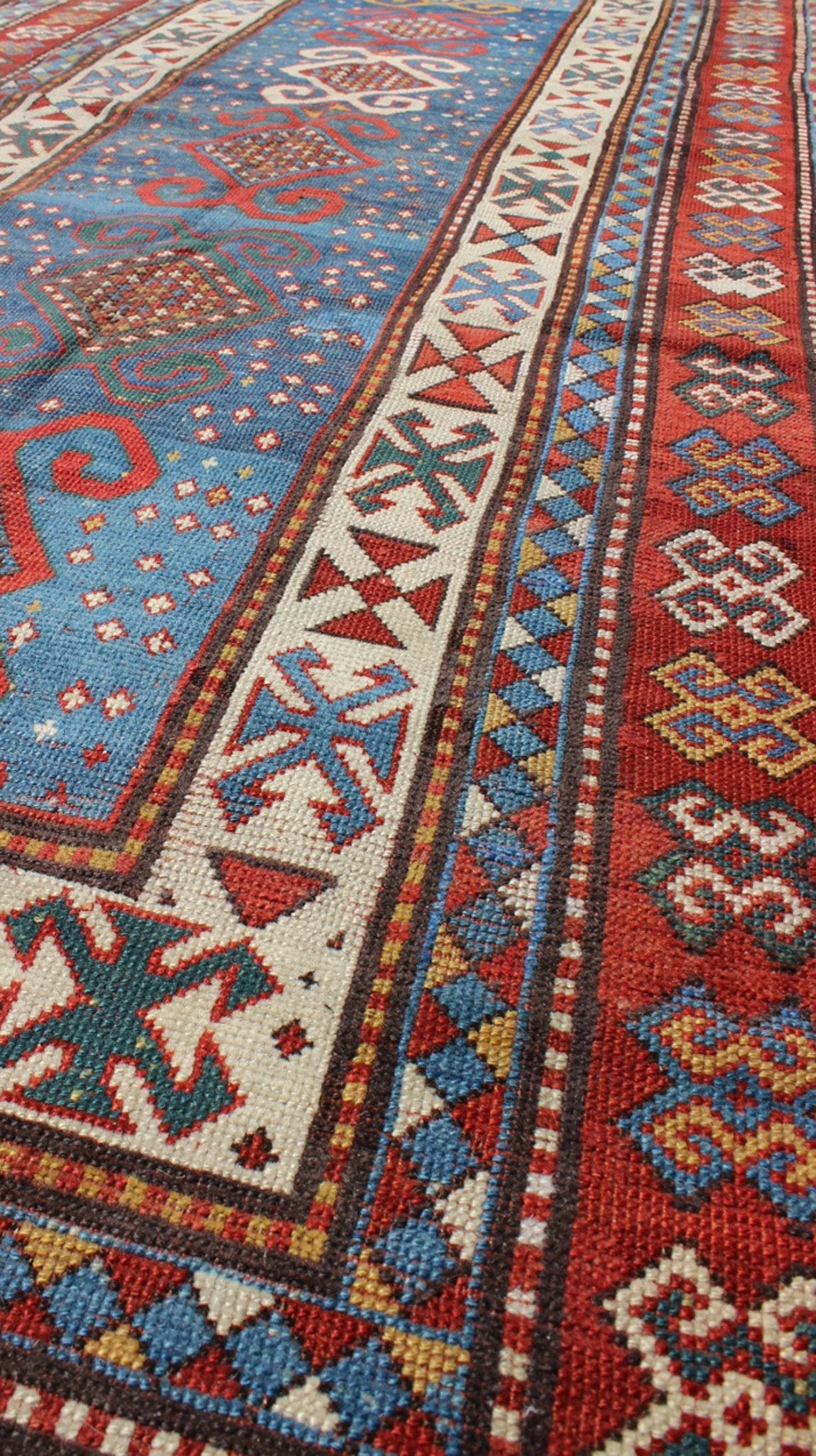 Red and Blue Antique Caucasian Kazak Rug with Vertical Tribal Medallions. Keivan Woven Arts / rug EMAC - 001, country of origin / type: Caucasus / Kazak, circa 1890 Measures: 4' x 8'10 The field design of this late 19th century antique Caucasian K... - Keivan Woven ArtsEMAC - 001 - 8801Rug