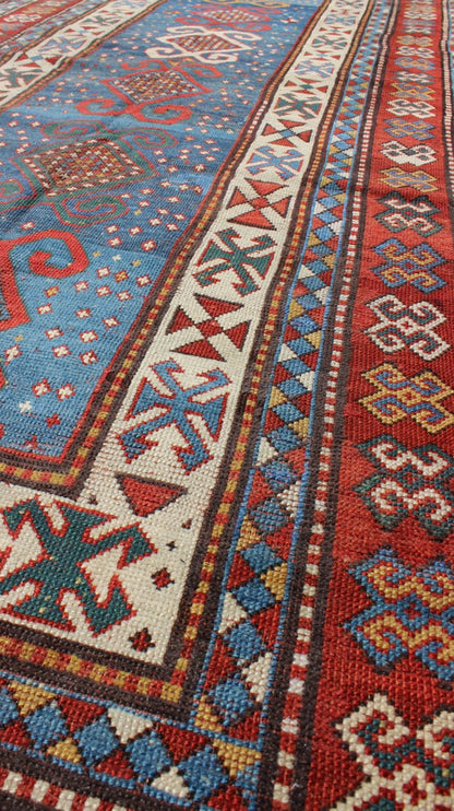 Red and Blue Antique Caucasian Kazak Rug with Vertical Tribal Medallions. Keivan Woven Arts / rug EMAC - 001, country of origin / type: Caucasus / Kazak, circa 1890 Measures: 4' x 8'10 The field design of this late 19th century antique Caucasian K... - Keivan Woven ArtsEMAC - 001 - 8801Rug