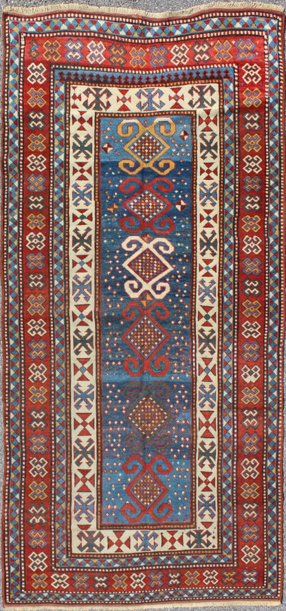 Red and Blue Antique Caucasian Kazak Rug with Vertical Tribal Medallions. Keivan Woven Arts / rug EMAC - 001, country of origin / type: Caucasus / Kazak, circa 1890 Measures: 4' x 8'10 The field design of this late 19th century antique Caucasian K... - Keivan Woven ArtsEMAC - 001 - 8801Rug