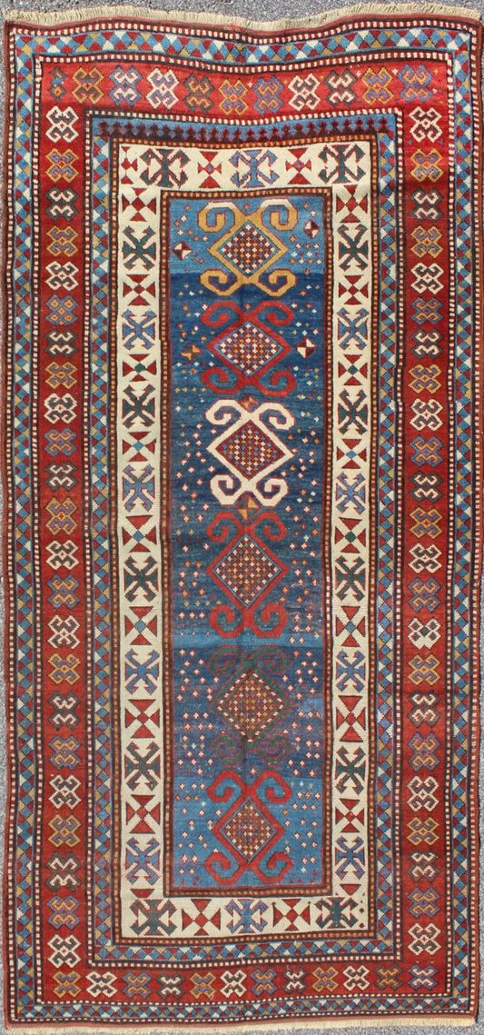 Red and Blue Antique Caucasian Kazak Rug with Vertical Tribal Medallions. Keivan Woven Arts / rug EMAC - 001, country of origin / type: Caucasus / Kazak, circa 1890 Measures: 4' x 8'10 The field design of this late 19th century antique Caucasian K... - Keivan Woven ArtsEMAC - 001 - 8801Rug