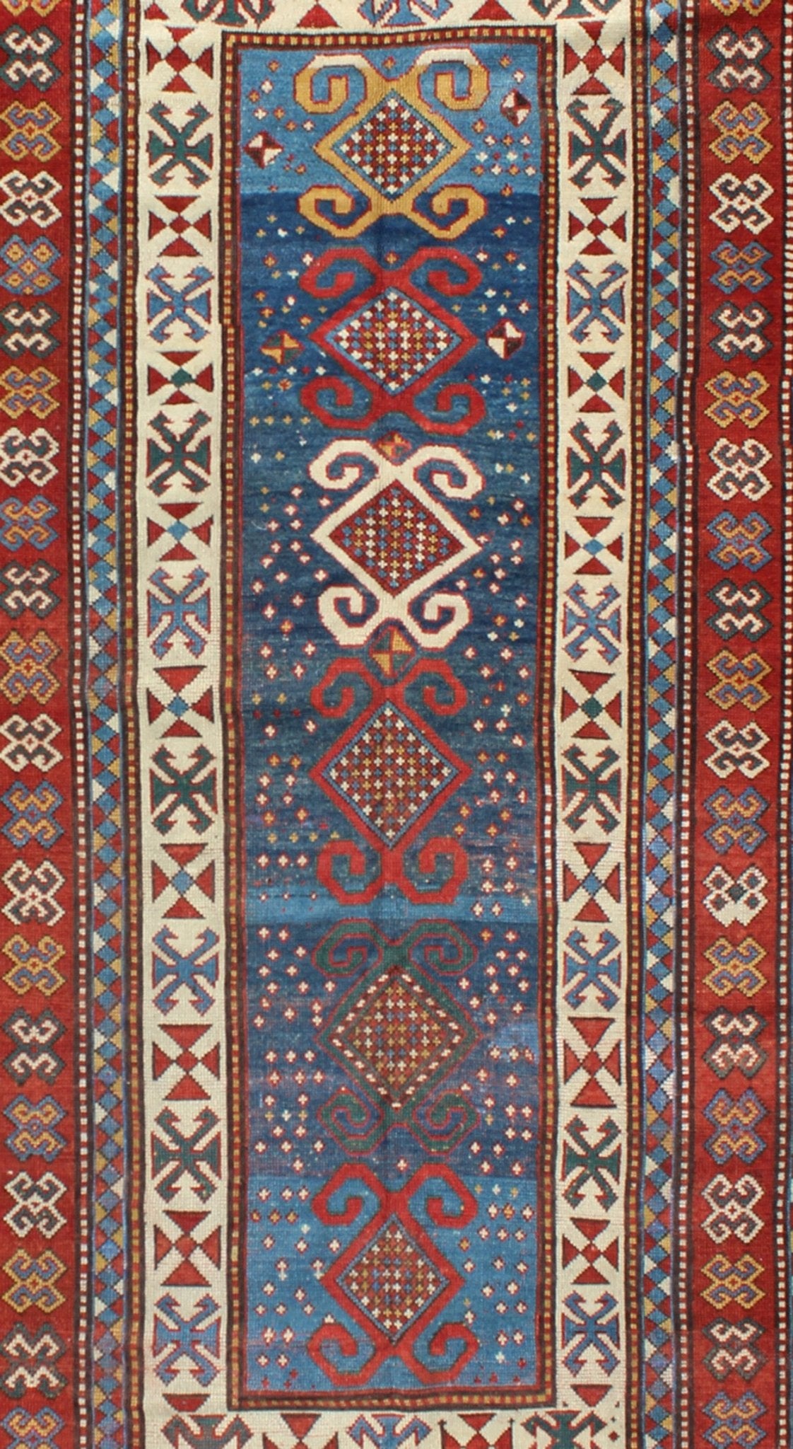 Red and Blue Antique Caucasian Kazak Rug with Vertical Tribal Medallions. Keivan Woven Arts / rug EMAC - 001, country of origin / type: Caucasus / Kazak, circa 1890 Measures: 4' x 8'10 The field design of this late 19th century antique Caucasian K... - Keivan Woven ArtsEMAC - 001 - 8801Rug
