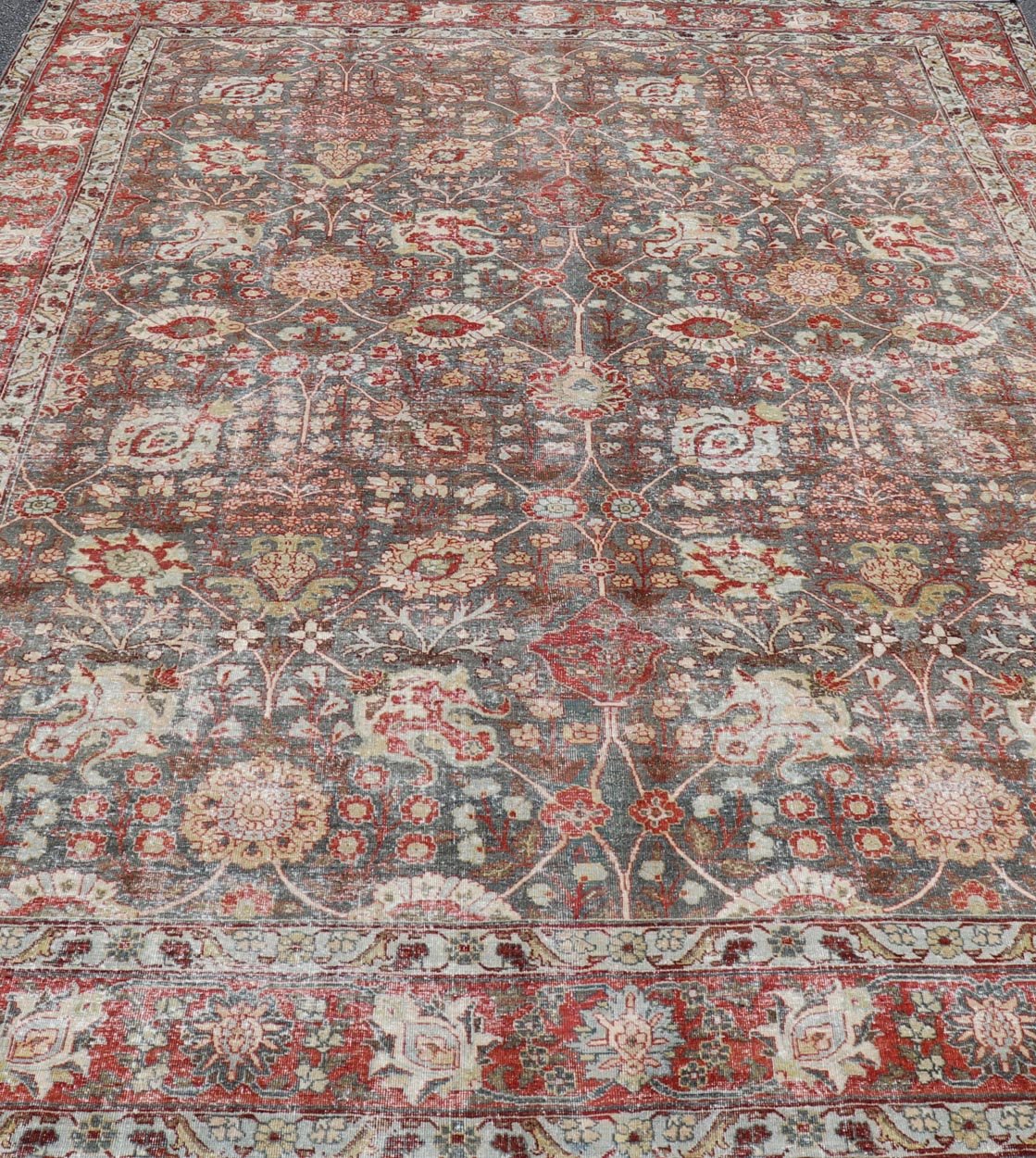 Antique Tabriz with All - Over Floral Sub - Geometric Design In Charcoal and Red. Antique Floral Tabriz, Keivan Woven Arts / rug EMB - 22102 - 15103, country of origin / type: Persian / Tabriz, circa Early - 20th Century. Measures: 8'0 x 11'6 This stunning... - Keivan Woven ArtsEMB - 22102 - 15103 - 20788Rug