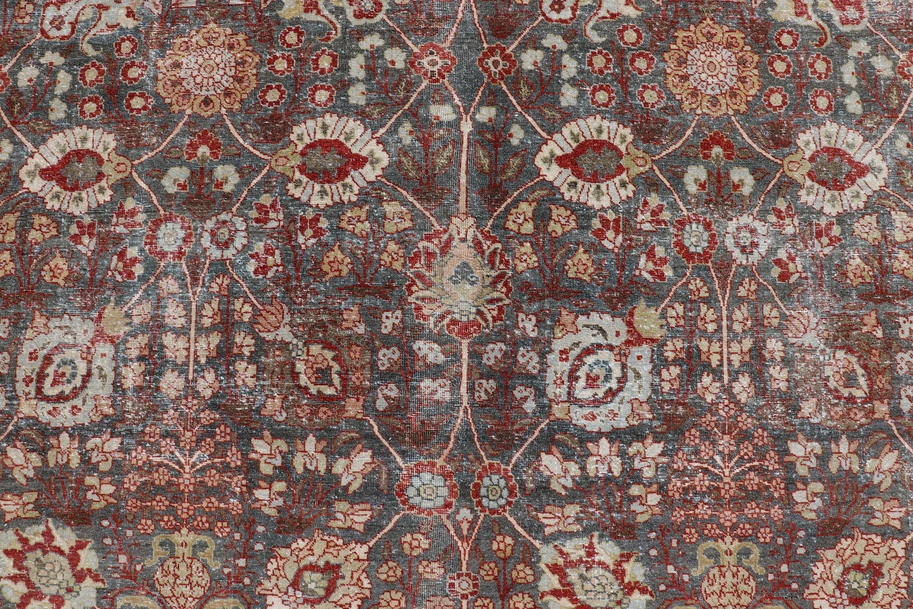 Antique Tabriz with All - Over Floral Sub - Geometric Design In Charcoal and Red. Antique Floral Tabriz, Keivan Woven Arts / rug EMB - 22102 - 15103, country of origin / type: Persian / Tabriz, circa Early - 20th Century. Measures: 8'0 x 11'6 This stunning... - Keivan Woven ArtsEMB - 22102 - 15103 - 20788Rug