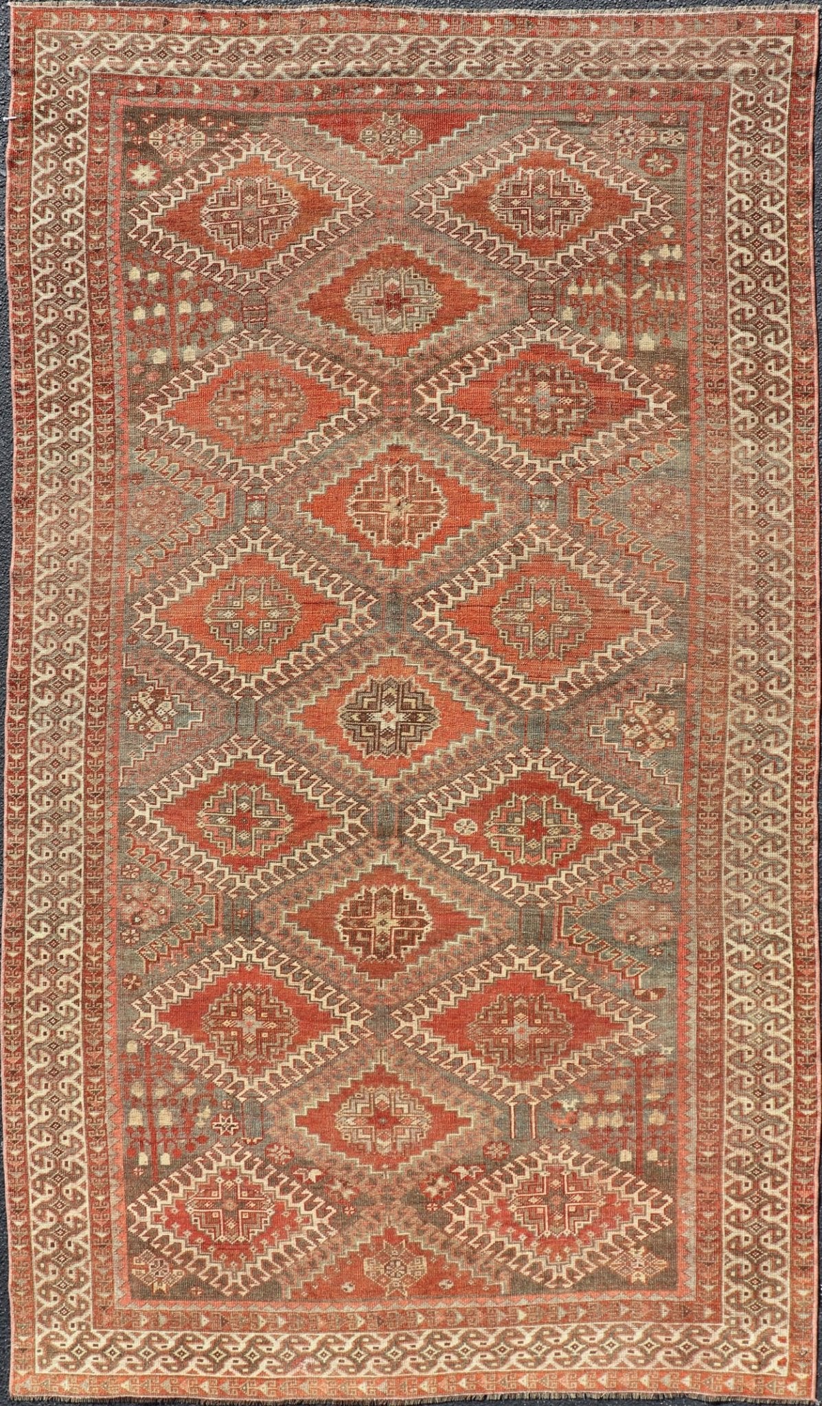 Measures: 5'6 x 9'6 Geometric Antique Persian Shiraz Rug with All - Over Medallion Design. Keivan Woven Arts / rug EMB - 22105 - 15105, country of origin / type: Iran / Shiraz, circa 1930. Persian Shiraz rug (circa early 20th century) features a u... - Keivan Woven ArtsEMB - 22105 - 15105 - 20800