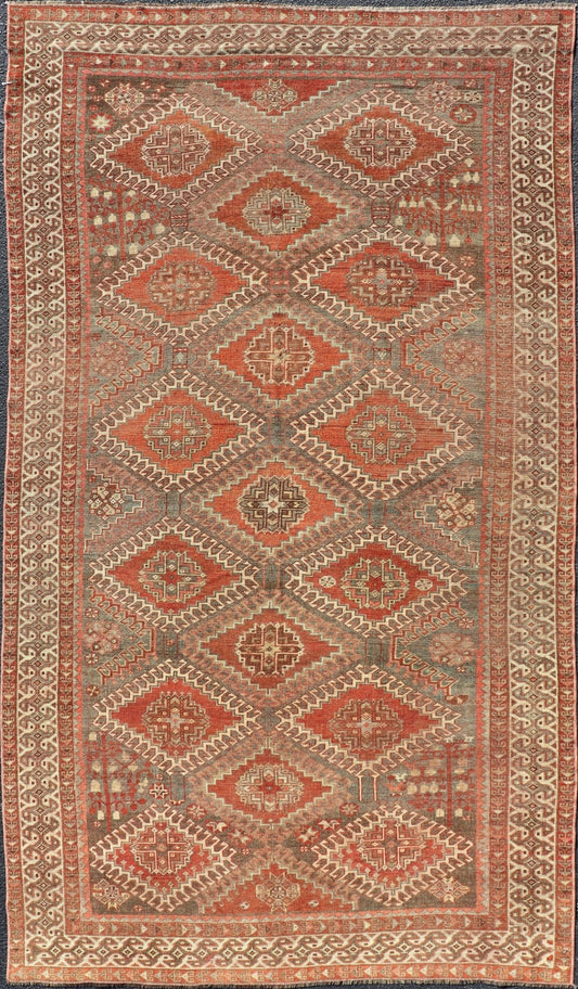 Measures: 5'6 x 9'6 Geometric Antique Persian Shiraz Rug with All - Over Medallion Design. Keivan Woven Arts / rug EMB - 22105 - 15105, country of origin / type: Iran / Shiraz, circa 1930. Persian Shiraz rug (circa early 20th century) features a u... - Keivan Woven ArtsEMB - 22105 - 15105 - 20800