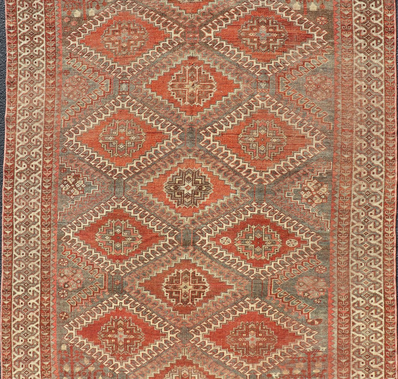Measures: 5'6 x 9'6 Geometric Antique Persian Shiraz Rug with All - Over Medallion Design. Keivan Woven Arts / rug EMB - 22105 - 15105, country of origin / type: Iran / Shiraz, circa 1930. Persian Shiraz rug (circa early 20th century) features a u... - Keivan Woven ArtsEMB - 22105 - 15105 - 20800