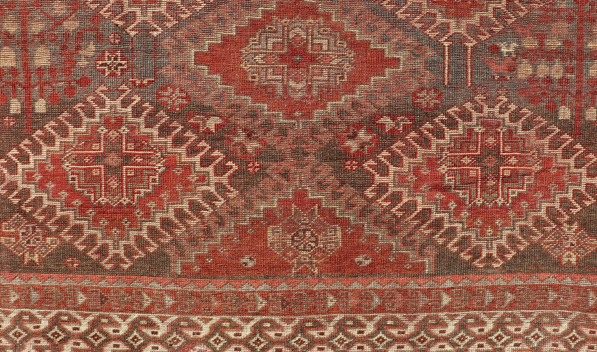 Measures: 5'6 x 9'6 Geometric Antique Persian Shiraz Rug with All - Over Medallion Design. Keivan Woven Arts / rug EMB - 22105 - 15105, country of origin / type: Iran / Shiraz, circa 1930. Persian Shiraz rug (circa early 20th century) features a u... - Keivan Woven ArtsEMB - 22105 - 15105 - 20800Rug