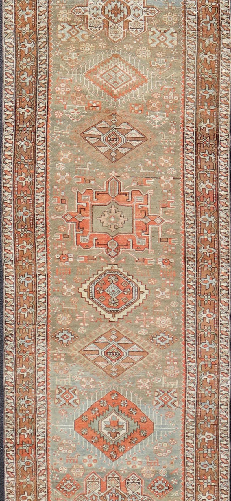 Measures: 3'4 x 15'2 Antique Persian Long Serapi Runner with Multi Medallions in Green, Blue, Orange. Keivan Woven Arts / rug/EMB - 22106 - 15050 country of origin / type: Iran / Karadjeh, circa 1910 This magnificent Persian Searpi - Heriz bears a... - Keivan Woven ArtsEMB - 22106 - 15050 - 20535Rug