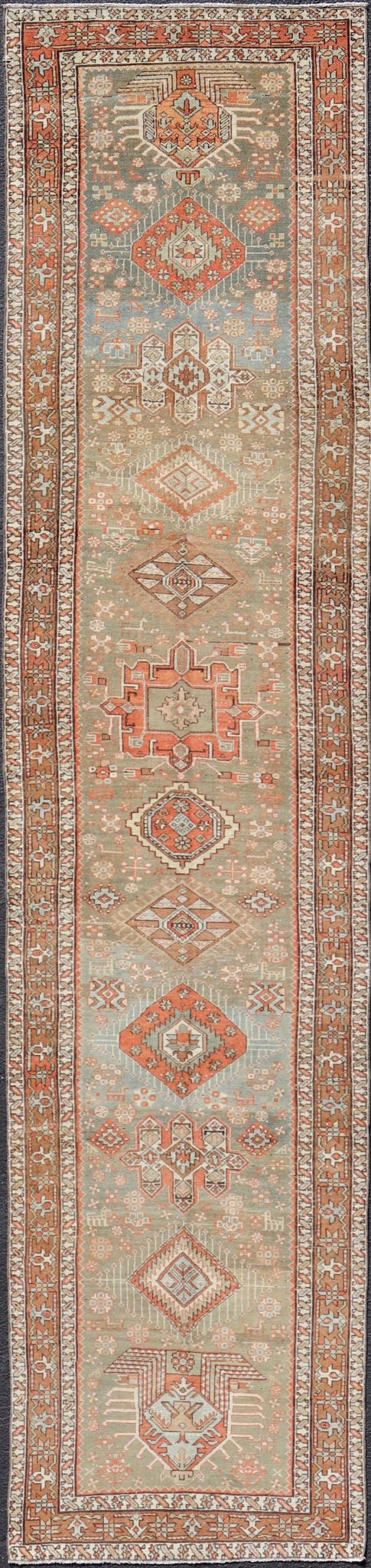 Measures: 3'4 x 15'2 Antique Persian Long Serapi Runner with Multi Medallions in Green, Blue, Orange. Keivan Woven Arts / rug/EMB - 22106 - 15050 country of origin / type: Iran / Karadjeh, circa 1910 This magnificent Persian Searpi - Heriz bears a... - Keivan Woven ArtsEMB - 22106 - 15050 - 20535Rug