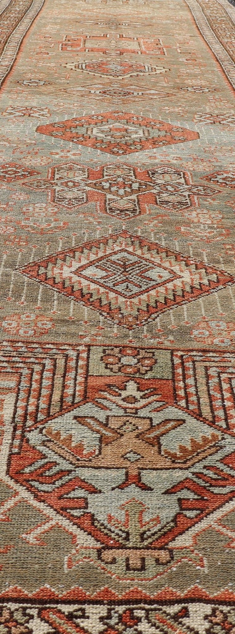 Measures: 3'4 x 15'2 Antique Persian Long Serapi Runner with Multi Medallions in Green, Blue, Orange. Keivan Woven Arts / rug/EMB - 22106 - 15050 country of origin / type: Iran / Karadjeh, circa 1910 This magnificent Persian Searpi - Heriz bears a... - Keivan Woven ArtsEMB - 22106 - 15050 - 20535Rug