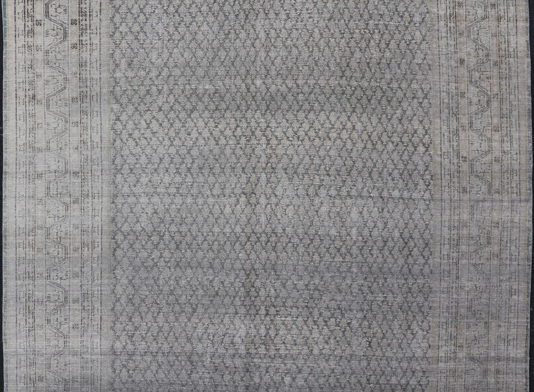 Measures: 8'0 x 11'2 Distressed Persian Antique Tabriz Carpet with Muted Floral Design in Light Gray Keivan Woven Arts/ rug EMB - 22115 - 15112, country of origin / type: Iran/ Tabriz, circa 1920. This muted antique distressed Persian Tabriz carpet ... - Keivan Woven ArtsEMB - 22115 - 15112 - 20830Rug