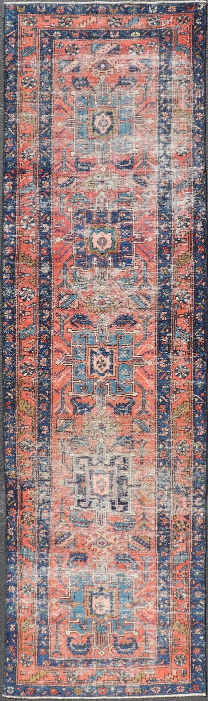 Geometric Medallion Antique Persian Heriz Runner in Orange - Red and Blue. Keivan Woven Arts / rug EMB - 22117 - 15011, country of origin / type: Iran / Heriz, circa 1920 Measures: 3'0 x 10'7 This antique Persian Heriz runner, from northwest Iran, dis... - Keivan Woven ArtsEMB - 22117 - 15011 - 20319Rug