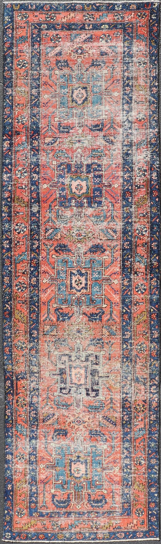 Geometric Medallion Antique Persian Heriz Runner in Orange - Red and Blue. Keivan Woven Arts / rug EMB - 22117 - 15011, country of origin / type: Iran / Heriz, circa 1920 Measures: 3'0 x 10'7 This antique Persian Heriz runner, from northwest Iran, dis... - Keivan Woven ArtsEMB - 22117 - 15011 - 20319Rug