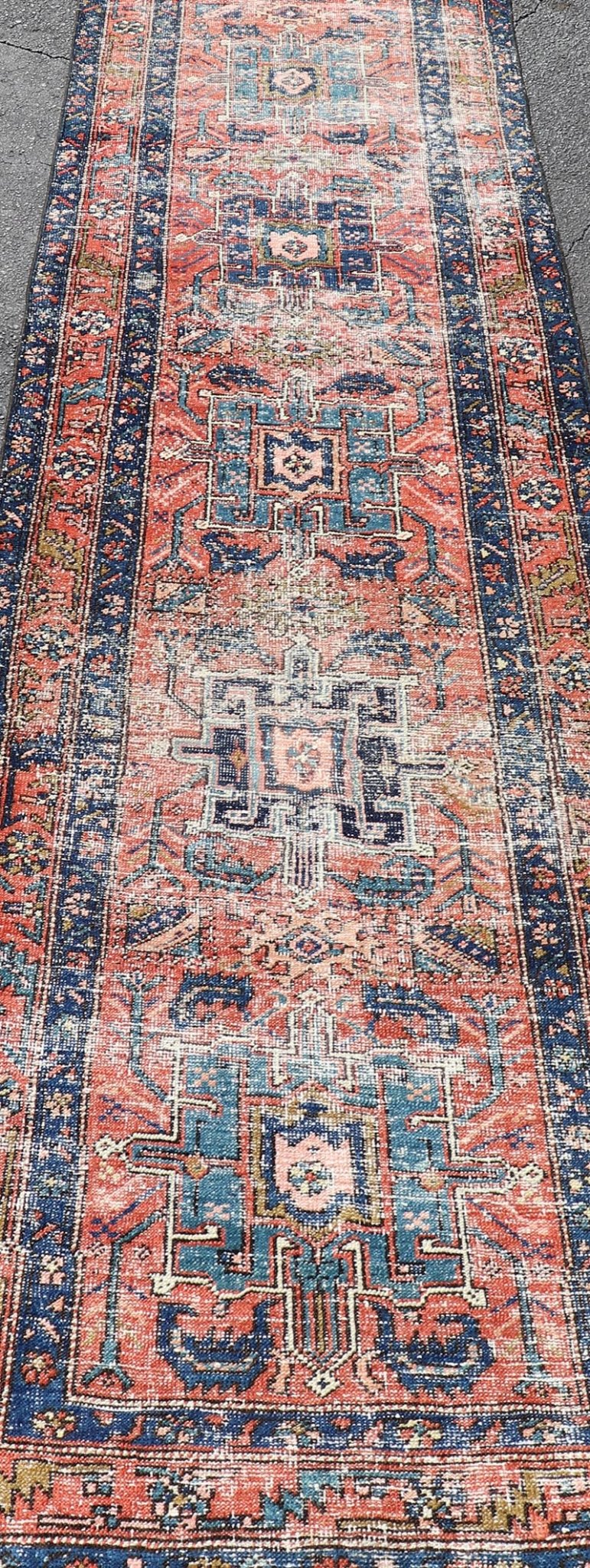 Geometric Medallion Antique Persian Heriz Runner in Orange - Red and Blue. Keivan Woven Arts / rug EMB - 22117 - 15011, country of origin / type: Iran / Heriz, circa 1920 Measures: 3'0 x 10'7 This antique Persian Heriz runner, from northwest Iran, dis... - Keivan Woven ArtsEMB - 22117 - 15011 - 20319Rug