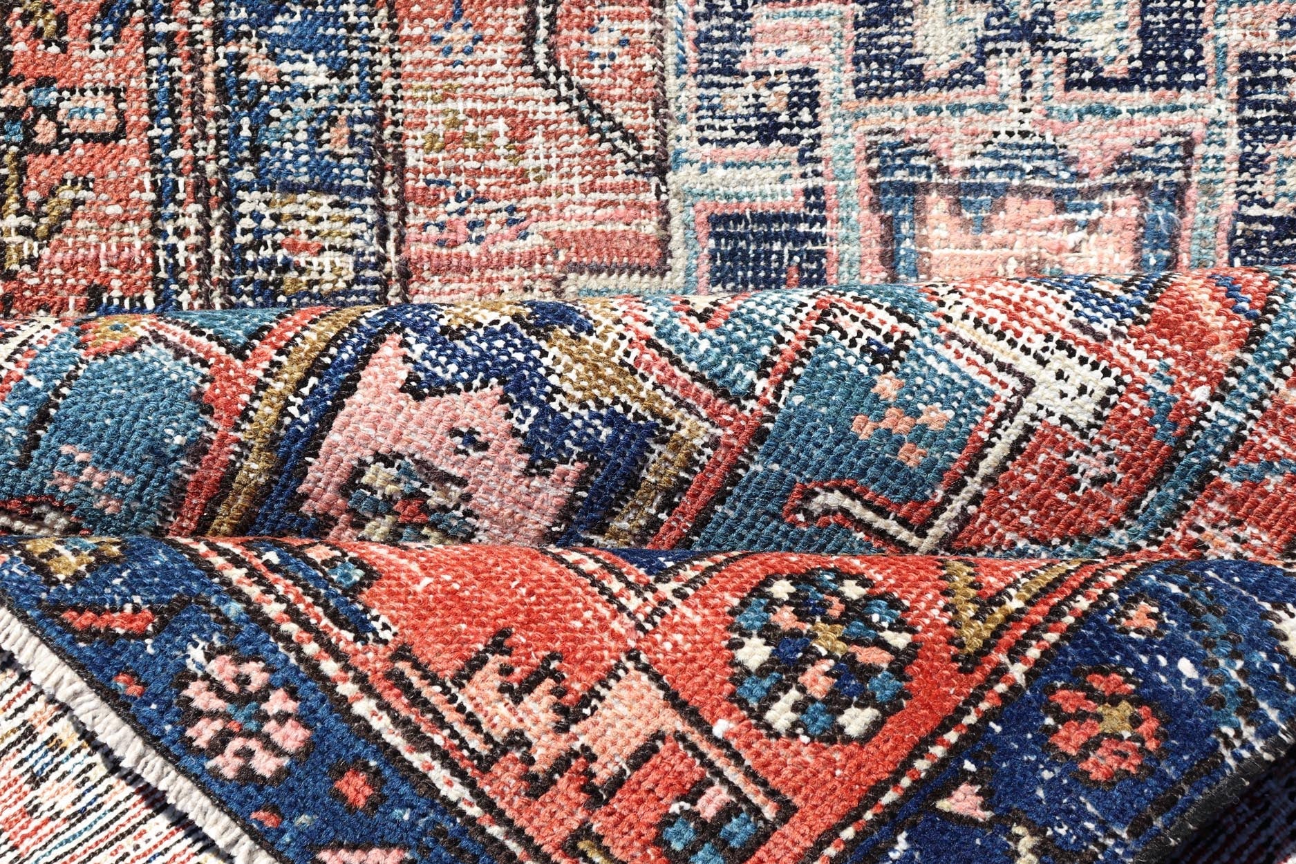 Geometric Medallion Antique Persian Heriz Runner in Orange - Red and Blue. Keivan Woven Arts / rug EMB - 22117 - 15011, country of origin / type: Iran / Heriz, circa 1920 Measures: 3'0 x 10'7 This antique Persian Heriz runner, from northwest Iran, dis... - Keivan Woven ArtsEMB - 22117 - 15011 - 20319Rug