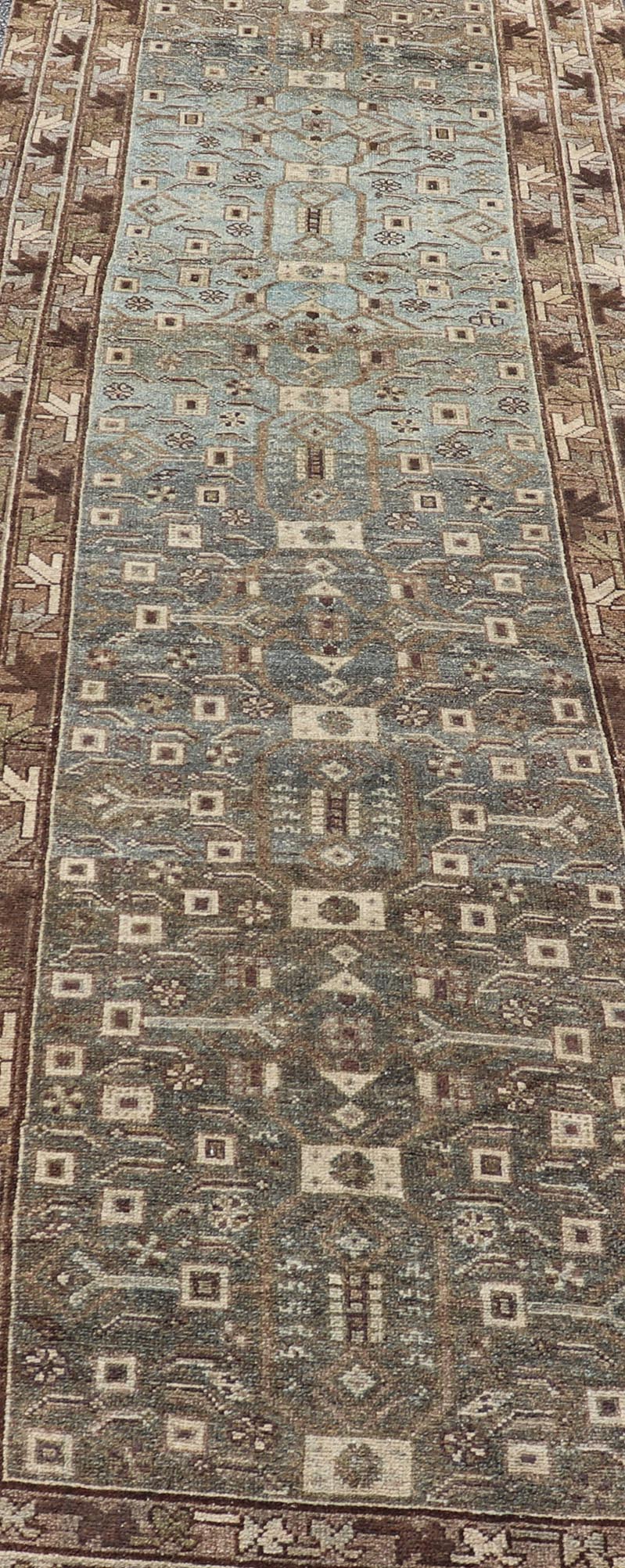 Antique N.W. Persian Runner with All - Over Design in Light Brown, L. Blue & Gray. Keivan Woven Arts; rug EMB - 22125 - 15015, country of origin / type: Iran / Hamadan, circa 1910. Measures: 3'4 x 12'7 This antique N.W. Persian runner has be... - Keivan Woven ArtsEMB - 22125 - 15015 - 20343Rug