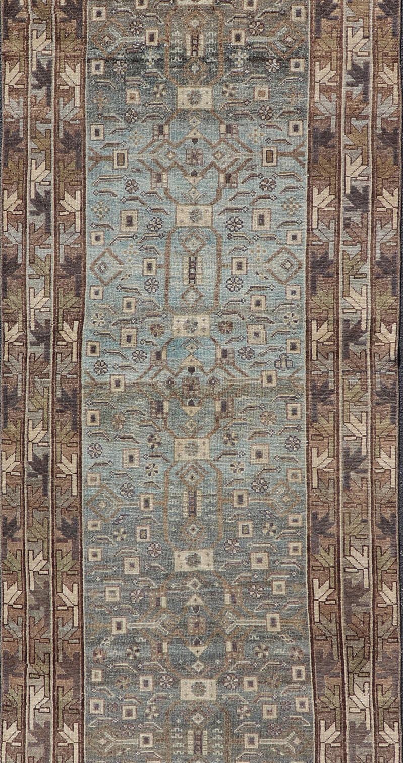 Antique N.W. Persian Runner with All - Over Design in Light Brown, L. Blue & Gray. Keivan Woven Arts; rug EMB - 22125 - 15015, country of origin / type: Iran / Hamadan, circa 1910. Measures: 3'4 x 12'7 This antique N.W. Persian runner has be... - Keivan Woven ArtsEMB - 22125 - 15015 - 20343Rug