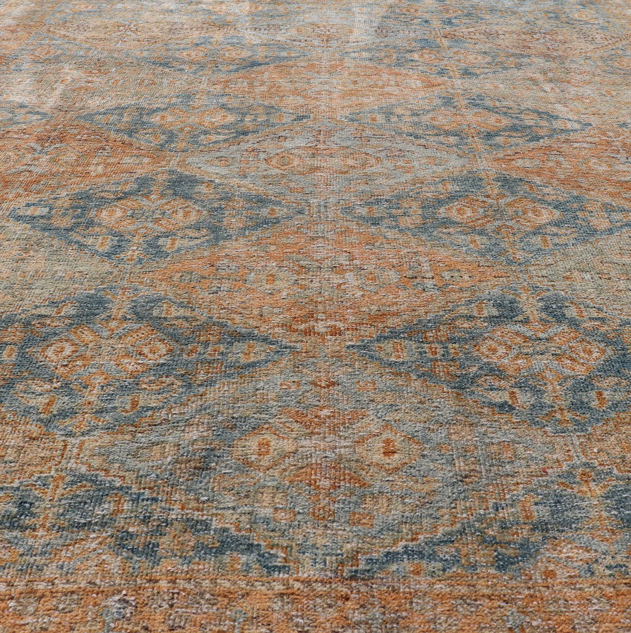 Measures: 5'2 x 6'6 Antique Persian Kurdish Rug with All - Over Geometric Medallion in Orange & Blue. Keivan Woven Arts / rug EMB - 22126 - 15014, country of origin / type: Iran / Kurdish circa 1920. This multicolored antique Persian Kurdish rug f... - Keivan Woven ArtsEMB - 22126 - 15014 - 20337Rug