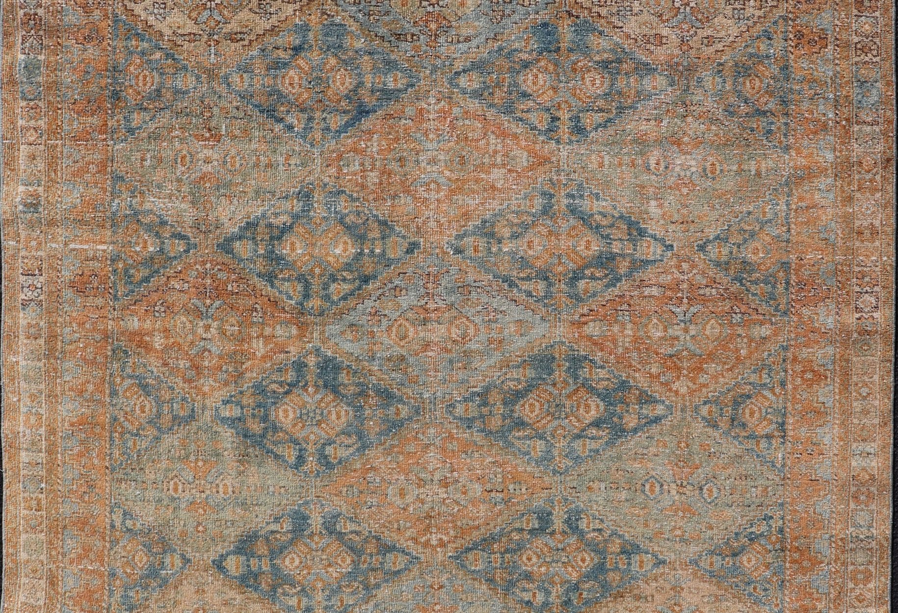 Measures: 5'2 x 6'6 Antique Persian Kurdish Rug with All - Over Geometric Medallion in Orange & Blue. Keivan Woven Arts / rug EMB - 22126 - 15014, country of origin / type: Iran / Kurdish circa 1920. This multicolored antique Persian Kurdish rug f... - Keivan Woven ArtsEMB - 22126 - 15014 - 20337Rug