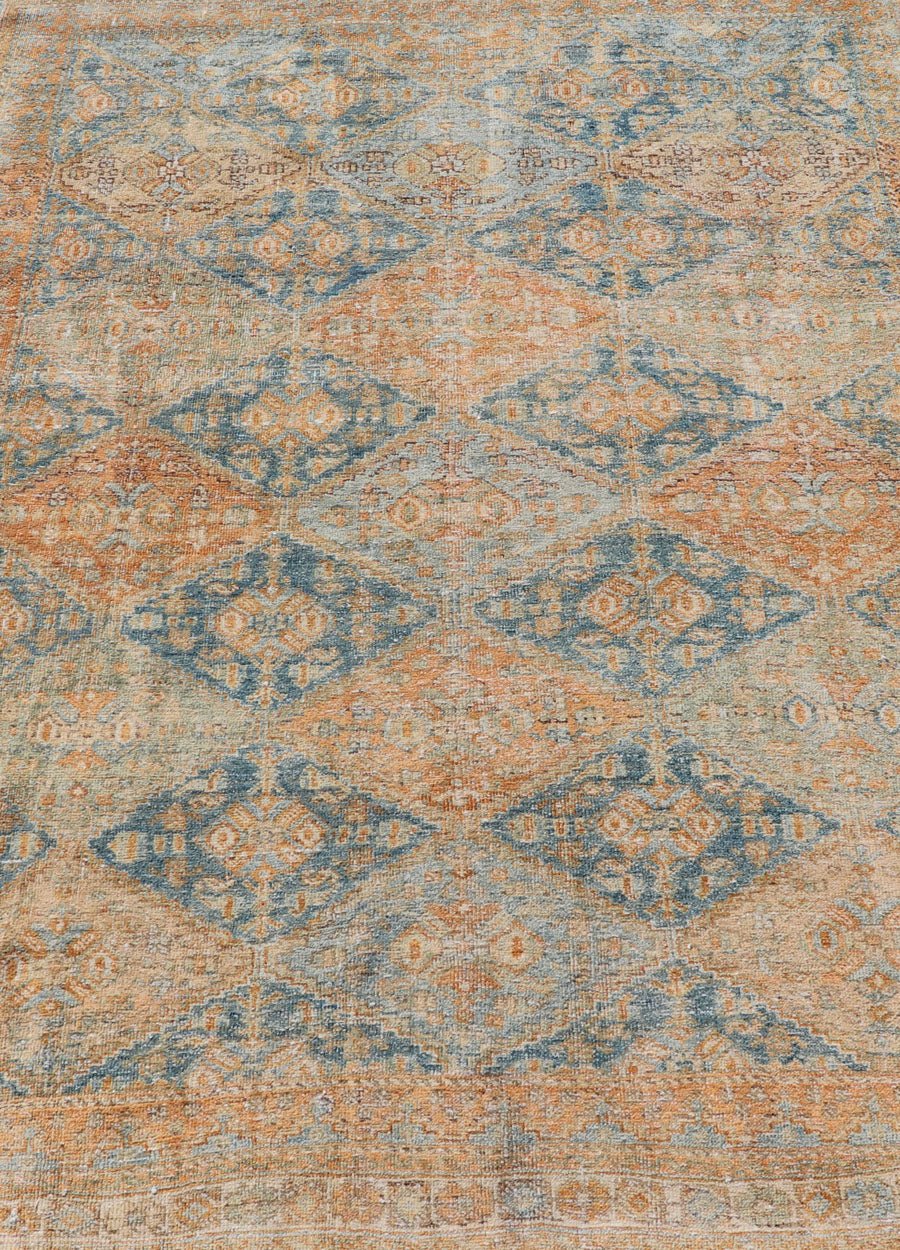 Measures: 5'2 x 6'6 Antique Persian Kurdish Rug with All - Over Geometric Medallion in Orange & Blue. Keivan Woven Arts / rug EMB - 22126 - 15014, country of origin / type: Iran / Kurdish circa 1920. This multicolored antique Persian Kurdish rug f... - Keivan Woven ArtsEMB - 22126 - 15014 - 20337Rug