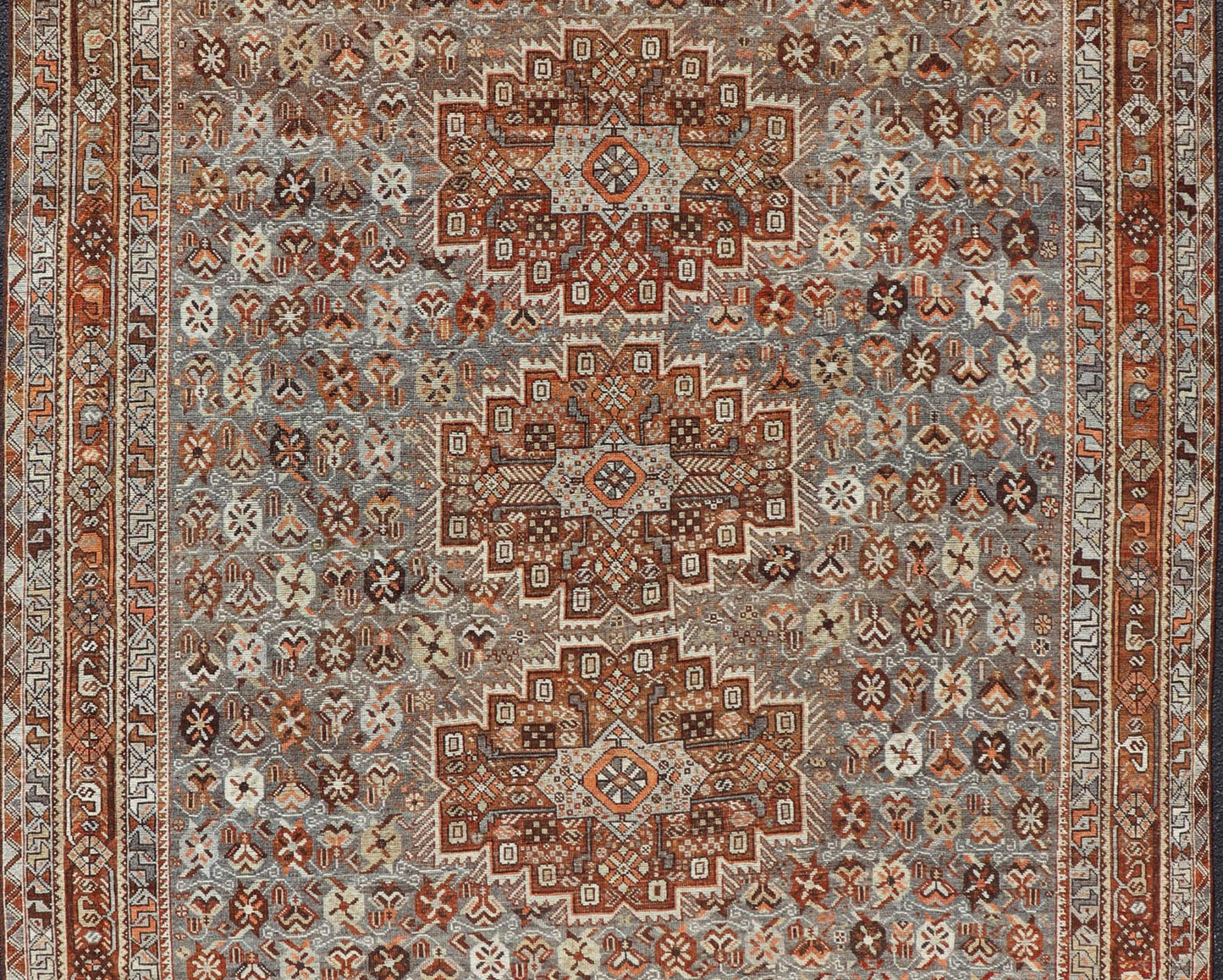 Measures: 6'10 x 9'0 Geometric Persian Shiraz Rug with Tri - Medallion Design in Shades Orange and Blue. Keivan Woven Arts / rug EMB - 22132 - 15042, country of origin / type: Iran / Shiraz, circa 1910. This Persian Shiraz rug (circa early 20th ce... - Keivan Woven ArtsEMB - 22132 - 15042 - 20487Rug