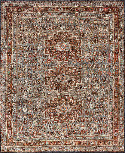 Measures: 6'10 x 9'0 Geometric Persian Shiraz Rug with Tri - Medallion Design in Shades Orange and Blue. Keivan Woven Arts / rug EMB - 22132 - 15042, country of origin / type: Iran / Shiraz, circa 1910. This Persian Shiraz rug (circa early 20th ce... - Keivan Woven ArtsEMB - 22132 - 15042 - 20487Rug
