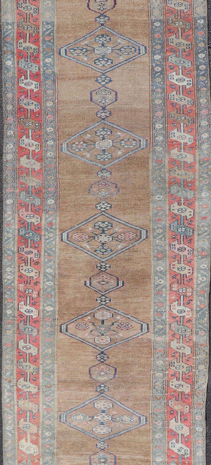 Antique Sarab Runner with Sub - Geometric Medallion Design in Red, Blue & Brown. Antique Sarab Runner, rug EMB - 22134 - 15040; Keivan Woven Arts, country of origin / type: Persian / Sarab, circa 1910. Measures: 3'4 x 13'2 This antique hand - knotted... - Keivan Woven ArtsEMB - 22134 - 15040 - 20475Rug