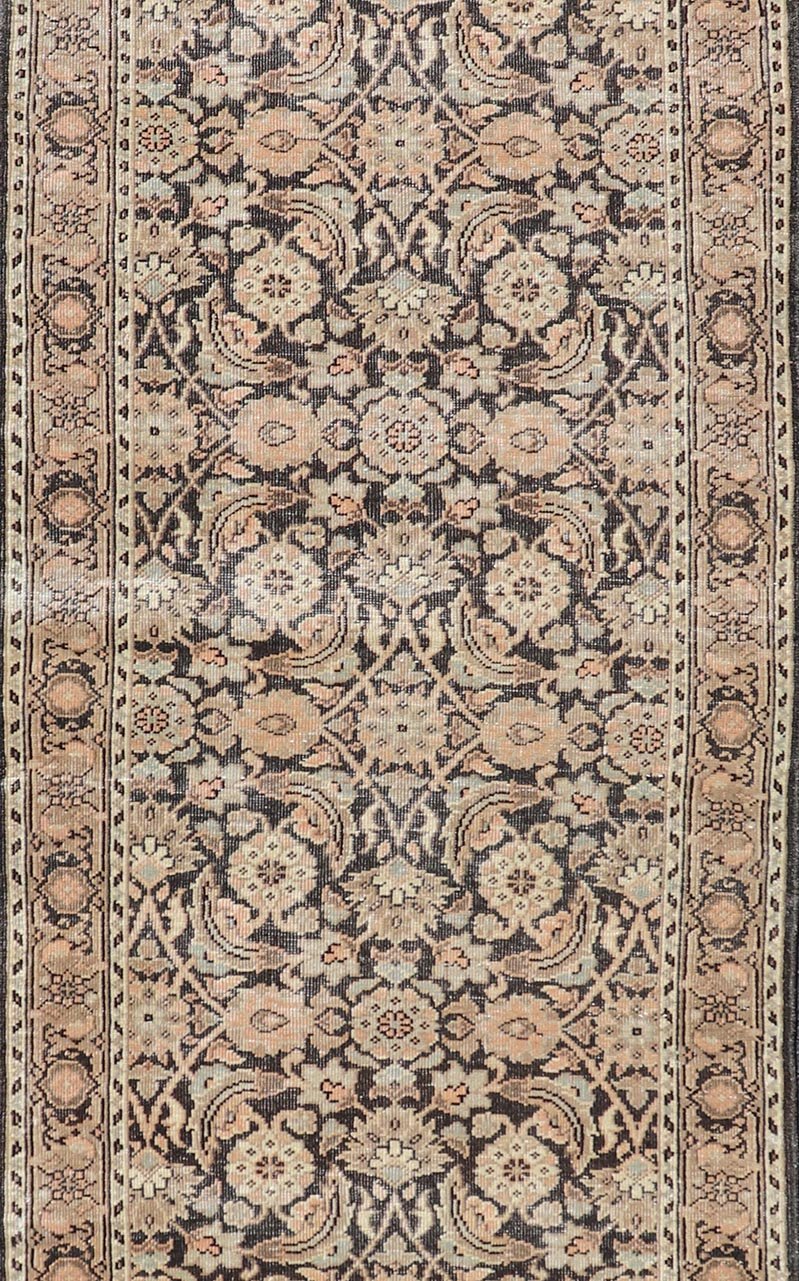 Measures: 2'8 x 9'4 Antique Persian Tabriz Runner with Ornate Floral Design in Earthy Tones. Keivan Woven Arts / EMB - 22135 - 15027, country of origin / type: Iran / Tabriz, circa 1920. This Persian runner with a sophisticated, all - over design ... - Keivan Woven ArtsEMB - 22135 - 15027 - 20403Rug